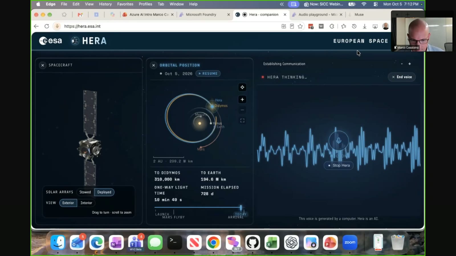 A computer screen showing the European Space Agency Hera mission control dashboard, featuring a 3D spacecraft model, orbital position map, and an active voice communication interface.